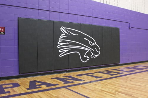 Mat on Gym Wall with Panther Logo paid for by Athletic Boosters